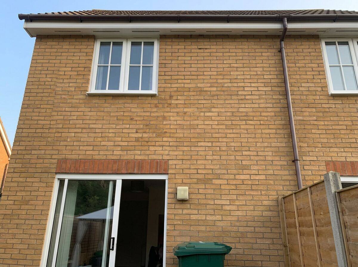 Heavy debris removed from blocked gutters during professional cleaning